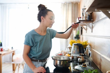 woman cooking easy cheap meals