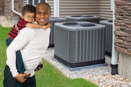 man with son happy about heat pump wattage