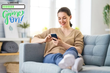 woman playing free $100 PayPal games