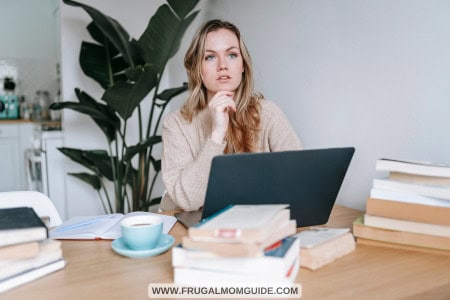 lady with laptop thinking about small business ideas for women