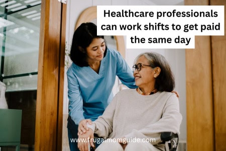 nurse helping older woman in wheelchair